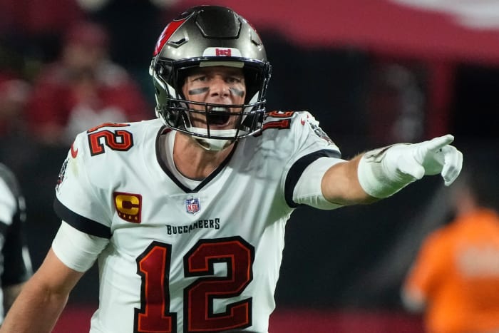 Buccaneers QB Tom Brady calls a play at the line of scrimmage